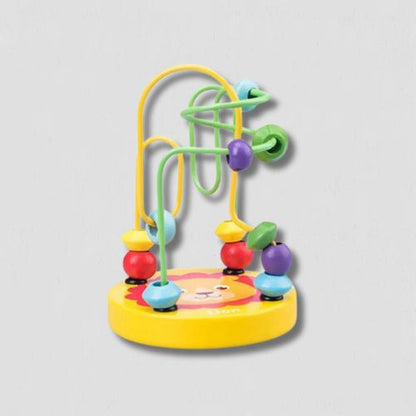 Jouet-bebe-jaune-lion