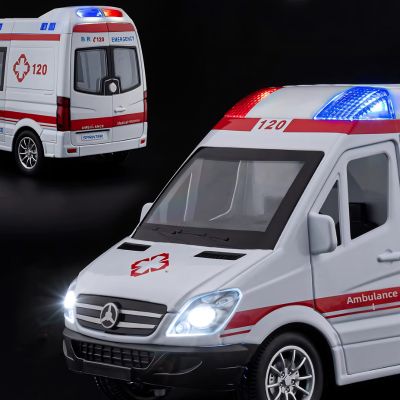 ambulance jouet avec phares allumés et gyrophares rouge et bleu sur fond noir