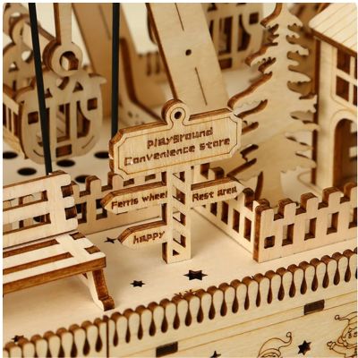 puzzle 3d bois grande roue musicale - détail mécanisme boîte à musique