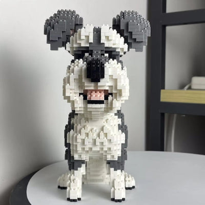 chien gris et blanc assis en mini-briques 3D avec vue de face