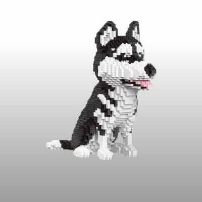 puzzle 3D en mini briques représentant un chien husky noir et blanc assis, avec la langue rose sortie