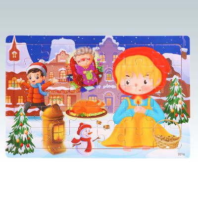 puzzle en bois enfant avec personnages, sapins décorés et maisons enneigées 