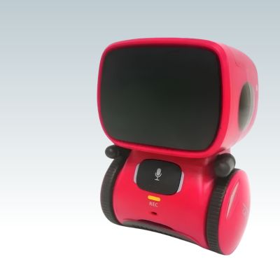 robot jouet rouge à deux roues avec visage noir et bouton microphone